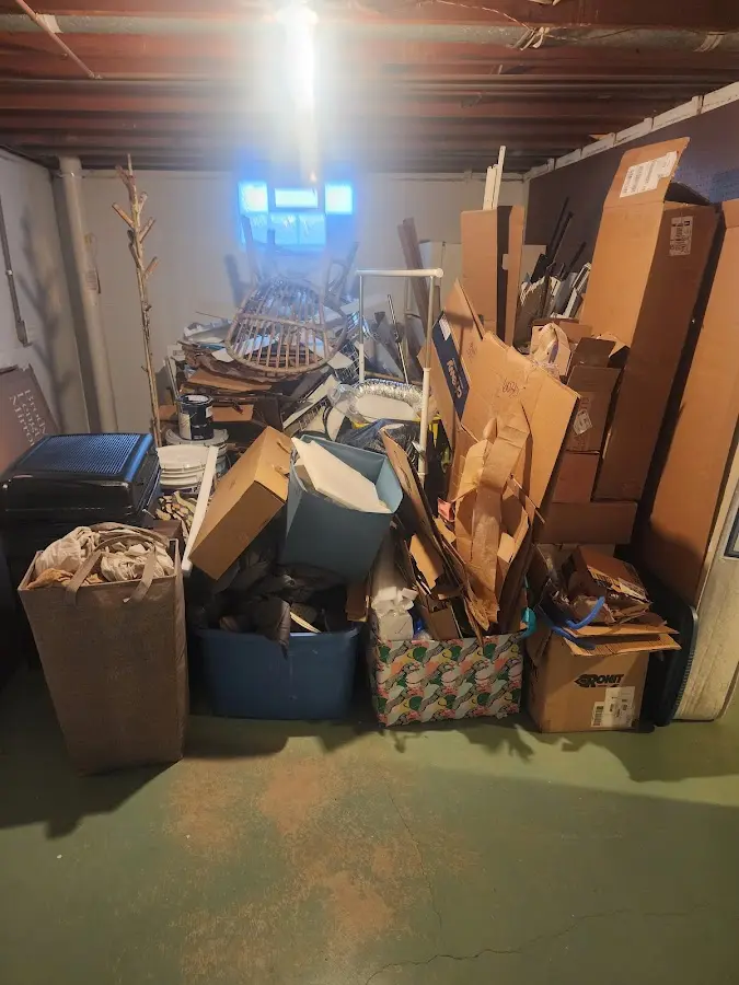 Roll-off dumpster container at job site for 2 Yard Dumpster Rental in Reserve